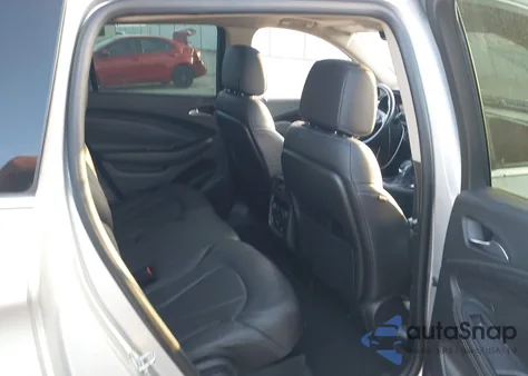 2017 Buick Envision Premium Ii z USA, uszkodzony, nr VIN LRBFXFSXXHD024053